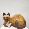 Gato vivo tumbado