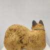 Gato vivo tumbado